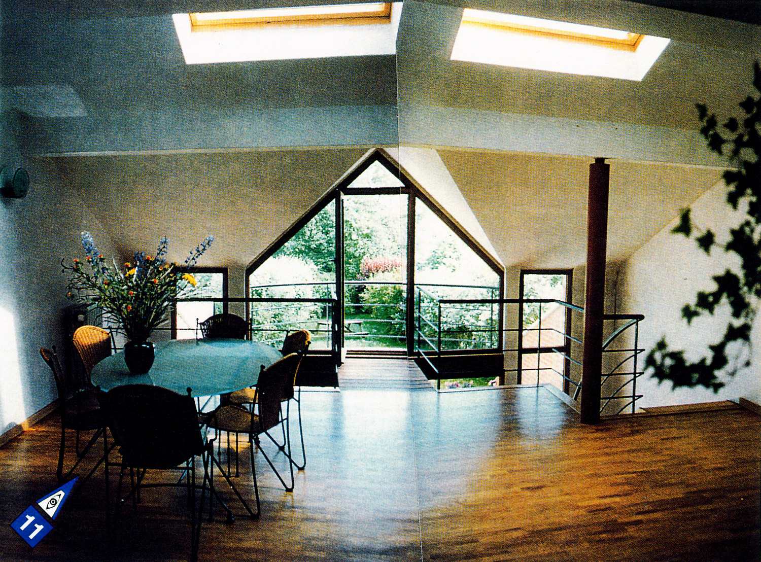 Extension vitrée donnant sur le jardin de la maison rénovée