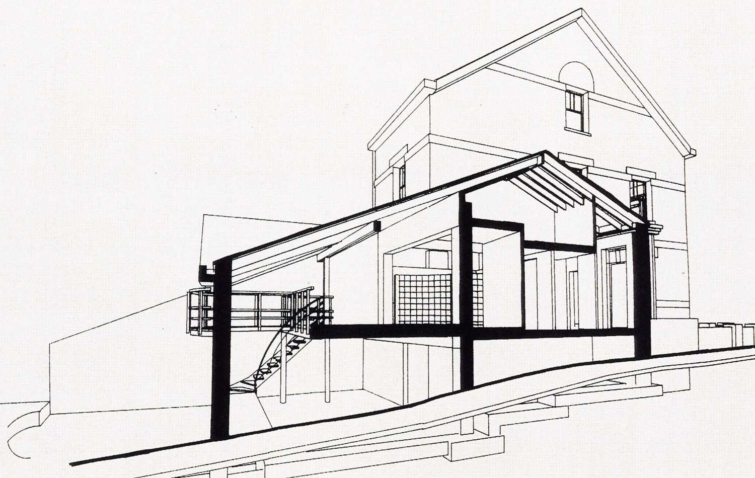 Vue latérale de la maison rénovée et de son extension